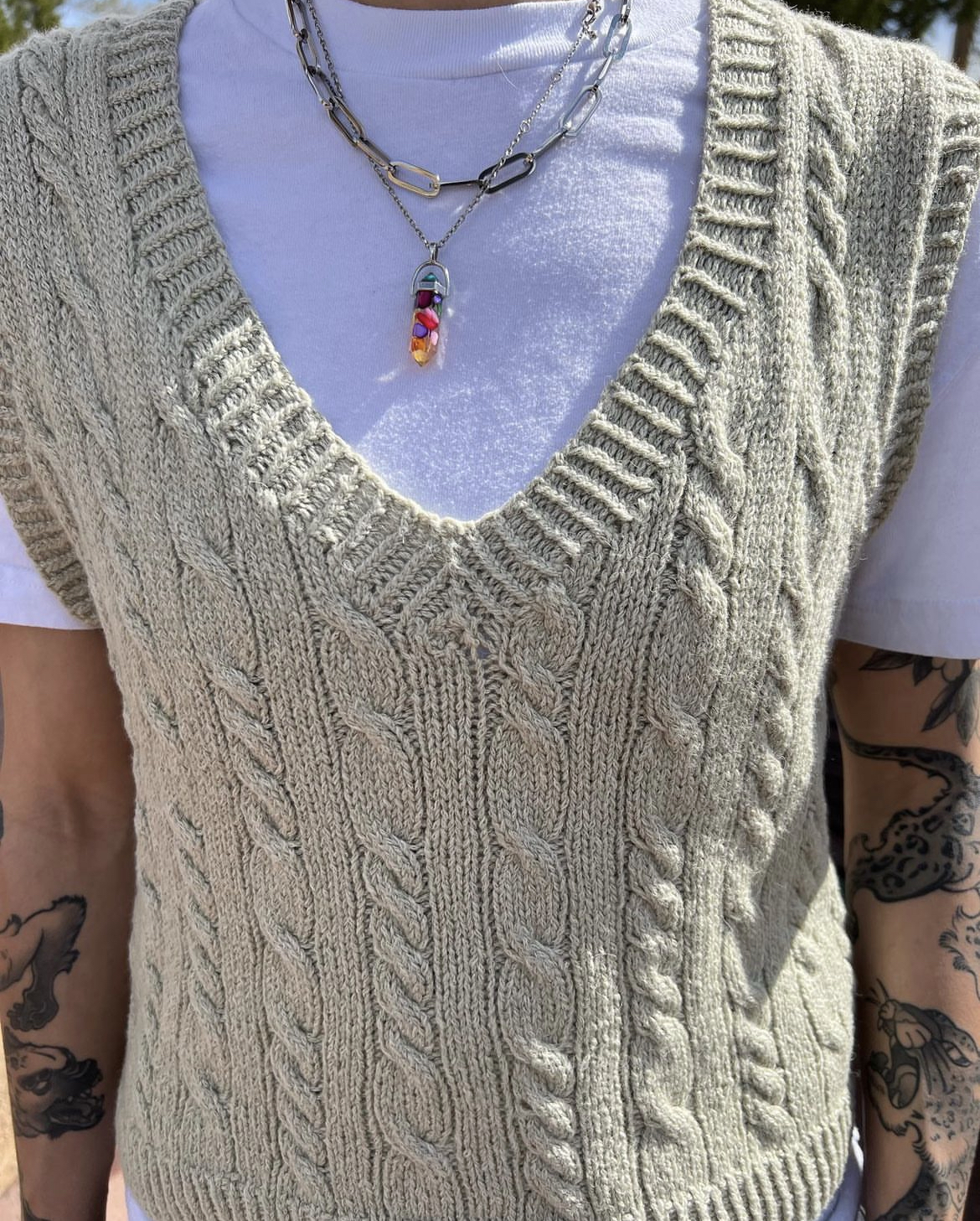 a mint green cabled sweater vest